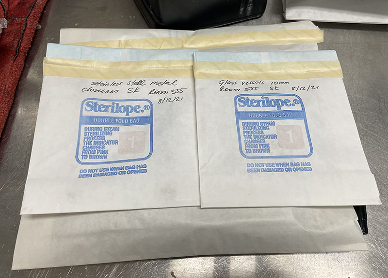 Collection of Glass Items in Autoclave Bags 